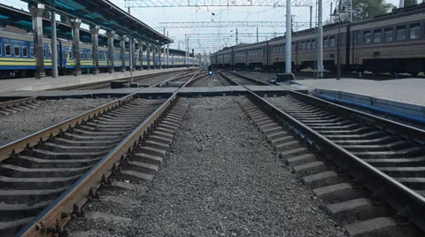 Train is passing by, camera is moving slowly between tracks Stock Footage 34839120