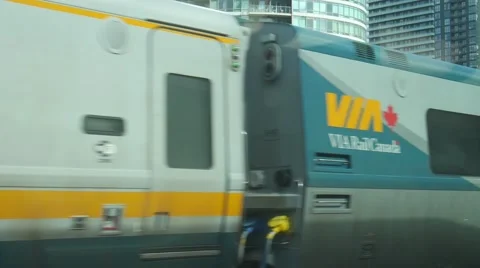 Train passing in city - Via Rail Canada train - Toronto, Ontario, Canada Stock Footage 68999740