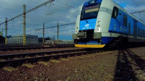 Train passing by, close up, cloudy sky background Stock Footage 256043047