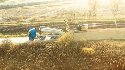 Train passing by construction site aerial footage Stock Footage 97798202