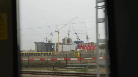 A train is passing by a construction site Stock-Footage 297858818