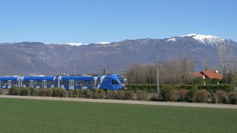 Train passing in a countryside landscape Stock Footage 87745460