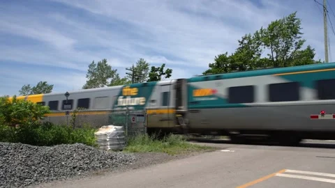 Train passing by crossing. 動画素材 198441919