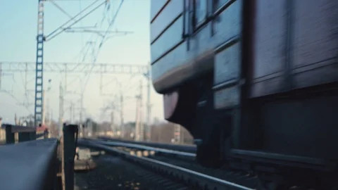 Train passing in dangerous proximity, blurred background Stock Footage 125136937