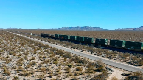 Train Passing By in the Desert Stock Footage 127010859