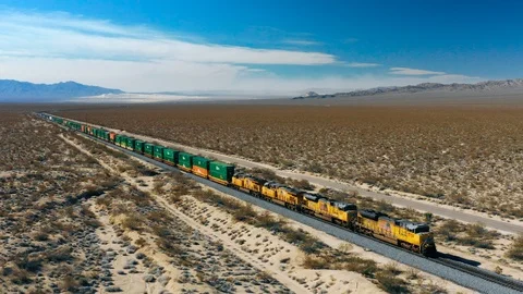 Train Passing By in the Desert Stock Footage 127011668