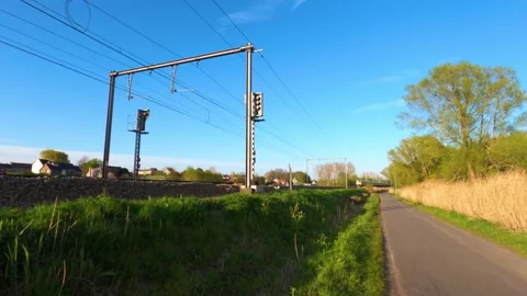 A train passing by during sunset Stock Footage 152977297