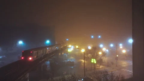 Train passing on Elevated Track at fogy Night time. Elements of Subway in Stock Footage 270450820