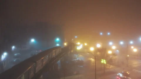 Train passing on Elevated Track at fogy Night time. Elements of Subway in Stock Footage 270840727