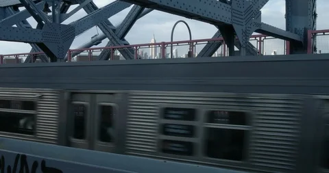 Train Passing Empire State Building on Bridge New York City Public Transit 4K Stock Footage 88369438