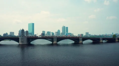 Train Passing by Harvard Bridge in front of Boston skyline Stock Footage 277915170