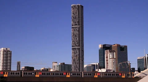 Train passing high rise Stock Footage 39886573