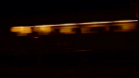 Train passing by at night Stock Footage 46441855