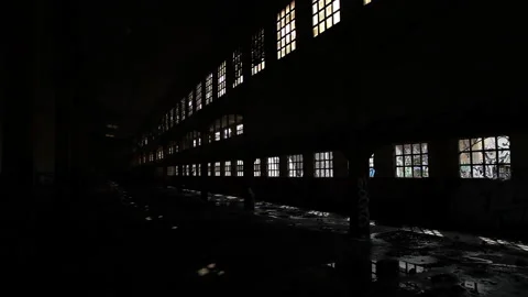 Train Passing Out Of Deserted Factory Stock Footage 232908330