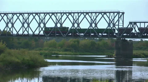 The train is passing by over the bridge Stock-Footage 54216392