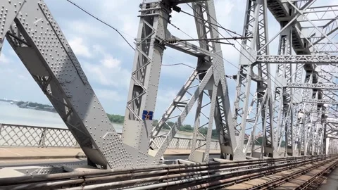The train is passing over the bridge. Stock Footage 323359616