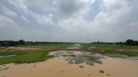 The train is passing over a dry river Stock Footage 313456183