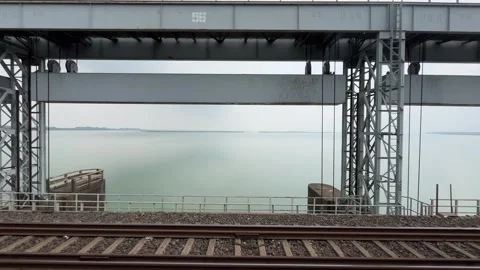 The train is passing over Farakka. Video stock 313454128