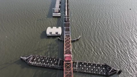 Train passing over the old River Draw Bridge in Perth Amboy, New Jersey Video stock 313985928