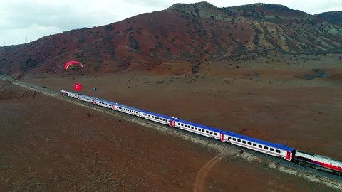 Train Passing Parachute Jumper Stock Footage 132891308
