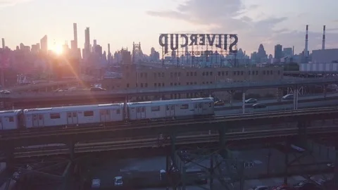 Train passing in Queens with the view on Manhattan Skyline Stock Footage 167848407