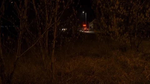 A train passing by the railroad crossroad in the middle of nowhere Stock Footage 107874775