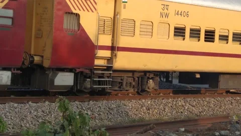A train is passing from the railway crossing. Stock Footage 145516836