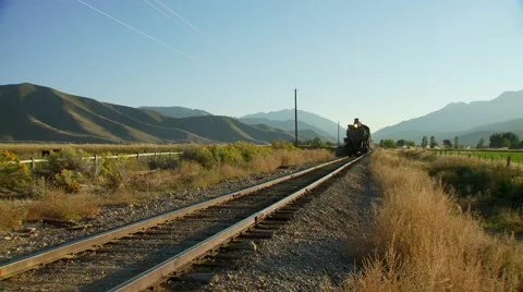 Train passing on railway track Stock Footage 55315298