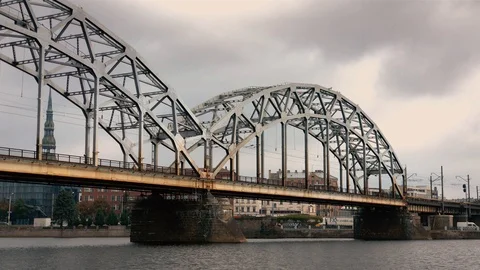 Train Passing on Riga Railway Iron Bridge Stock Footage 122379376