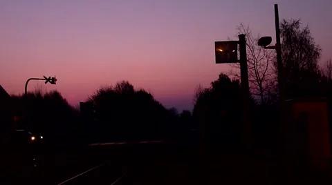 Train passing by at sunrise Stock Footage 46445547