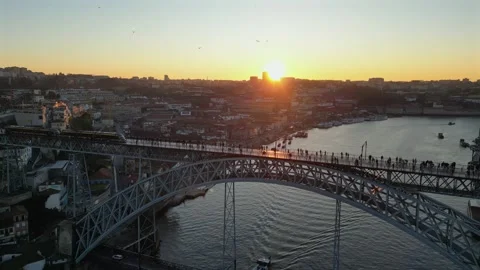 Train passing, sunset in the background, Video in the city of Porto in Portugal Stock Footage 278285735