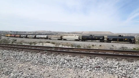 Train passing through the desert Stock Footage 109170726