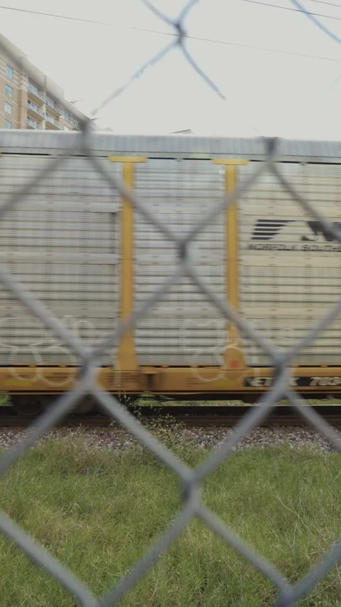 Train Passing By Through Fence Video stock 246983922