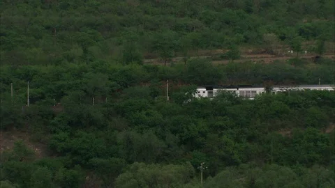 Train passing through The Great Wall of China Stock Footage 88828428