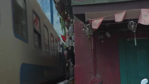 Train Passing Through Hanoi Train Street Near Shops And Homes Stock Footage 336725279