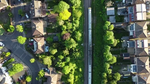 Train Passing Through London Green Suburb Video stock 275321608