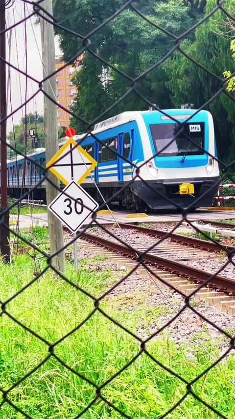 Train passing through a railway junction Stock Footage 247309966