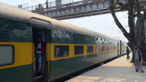 Train passing through a railway station Stock Footage 170070049