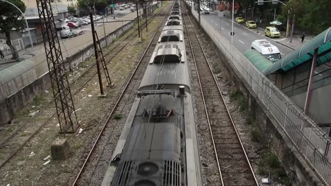Train passing through the suburb of Rio de Janeiro Stock Footage 248710943