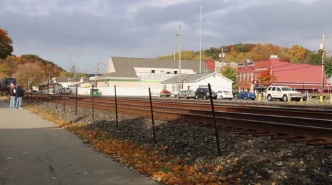 Train Passing Through Town (1 of 3) Stock Footage 43785535