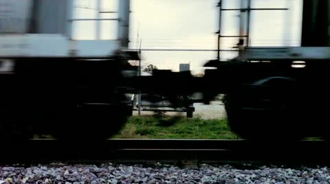 Train passing by on tracks, close-up Stock Footage 12372122
