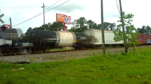 TRAIN PASSING ON TRACKS Stock Footage 109328066