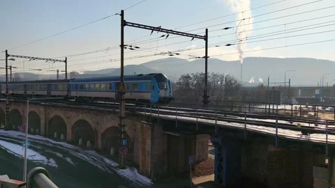 Train Passing By: Train Crosses Historic Viaduct Video stock 303092410