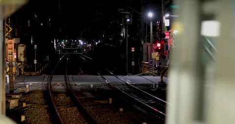 Train Passing Trough Station At Night. T 