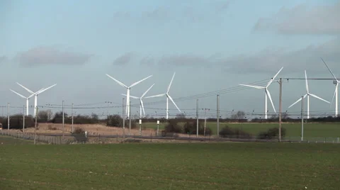 Train passing wind farm Stock Footage 34300865