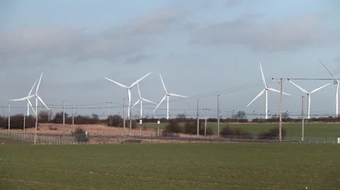 Train passing wind farm Stock Footage 34301311