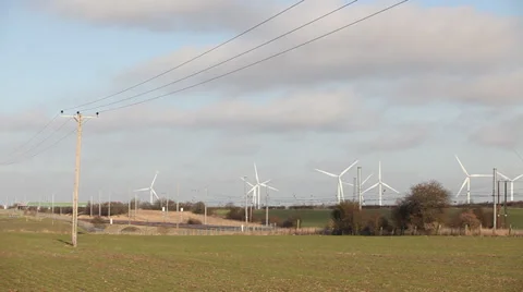 Train passing wind farm Stock Footage 34302847