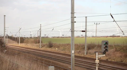 Train passing wind farm Stock Footage 34303350
