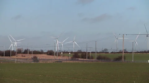 Train passing wind farm Stock Footage 34313450