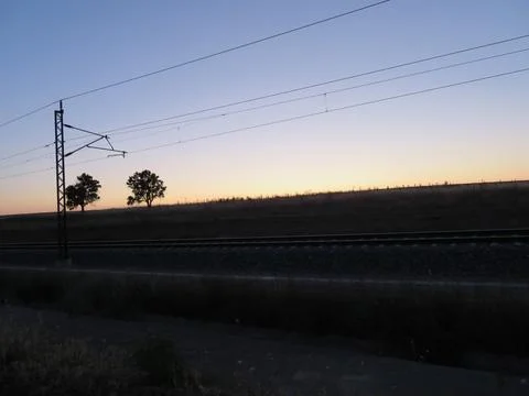 Train path sunset electric sky sunset horizon Stockfoto's